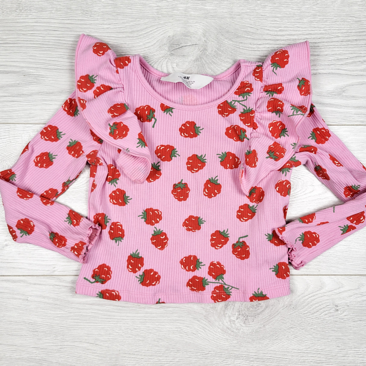 H and M pink ribbed strawberry print ruffle shirt. Size 18-24 months