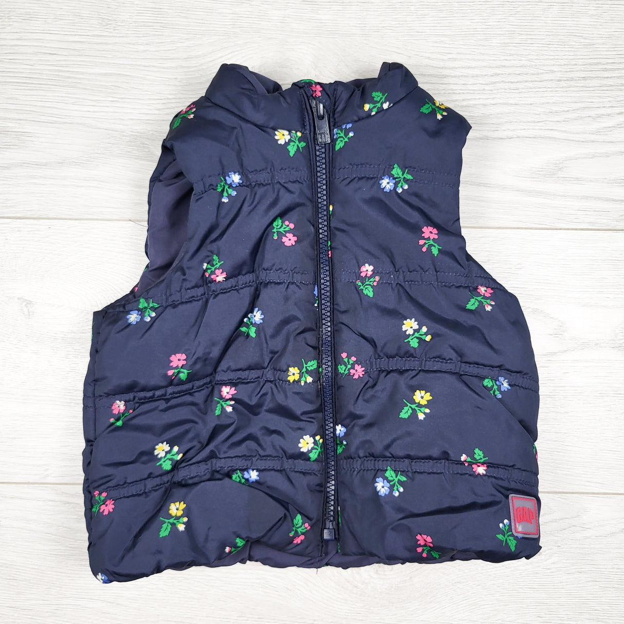 Gap navy floral print puffer vest. Size 18-24 months