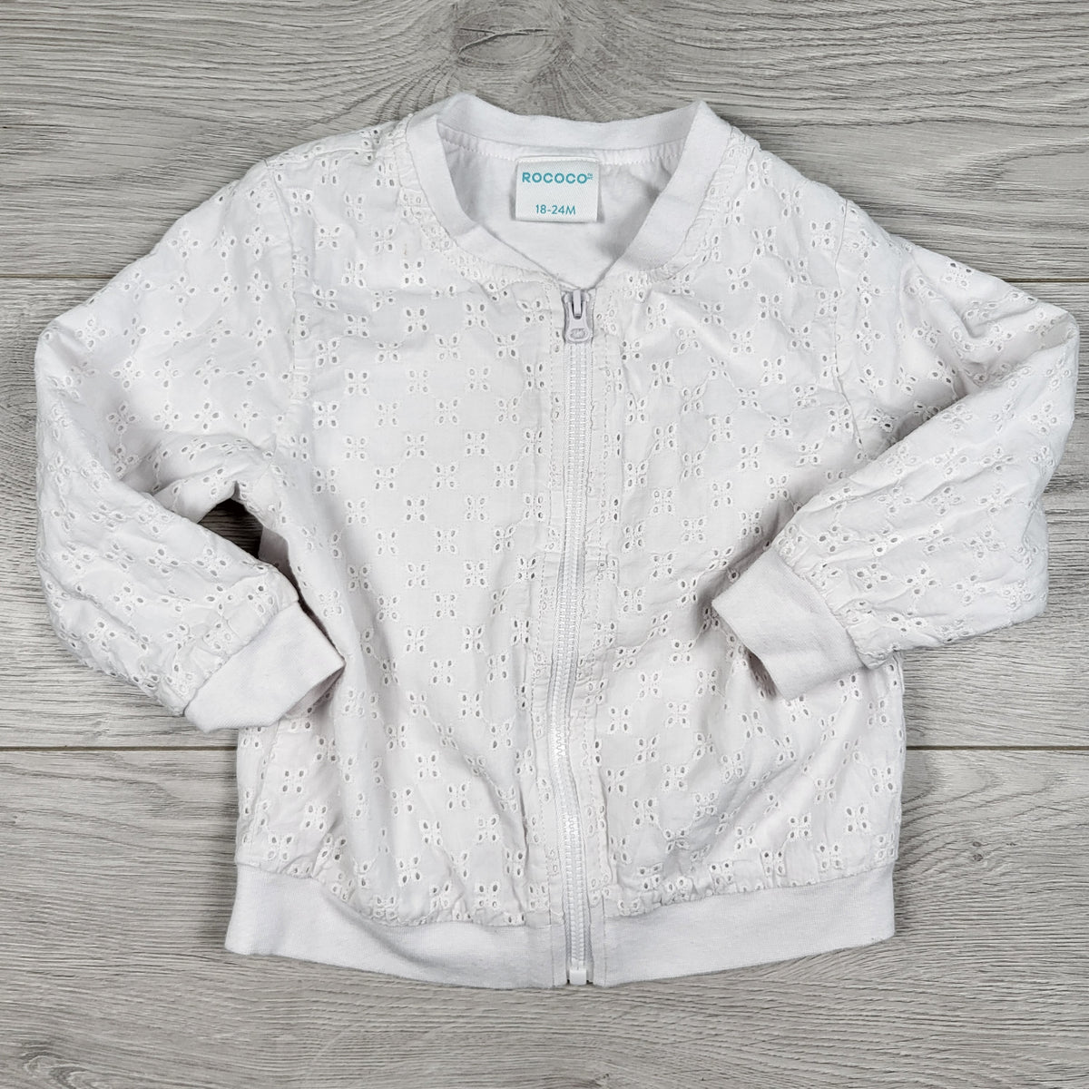 Rococo white zip up eyelet jacket. Size 18-24 months