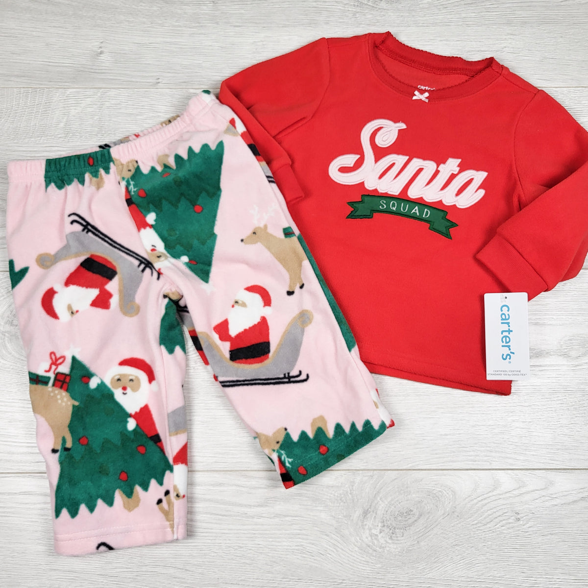NEW - Carters fleece 2pc "Santa Squad" PJs. Size 12 months