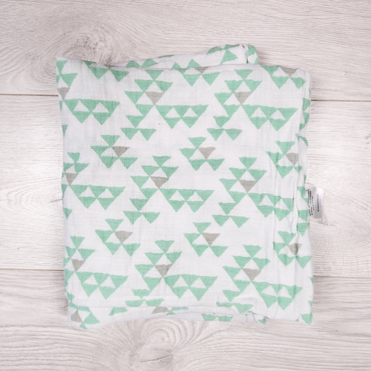 Swaddle Me triangle print muslin swaddle blanket