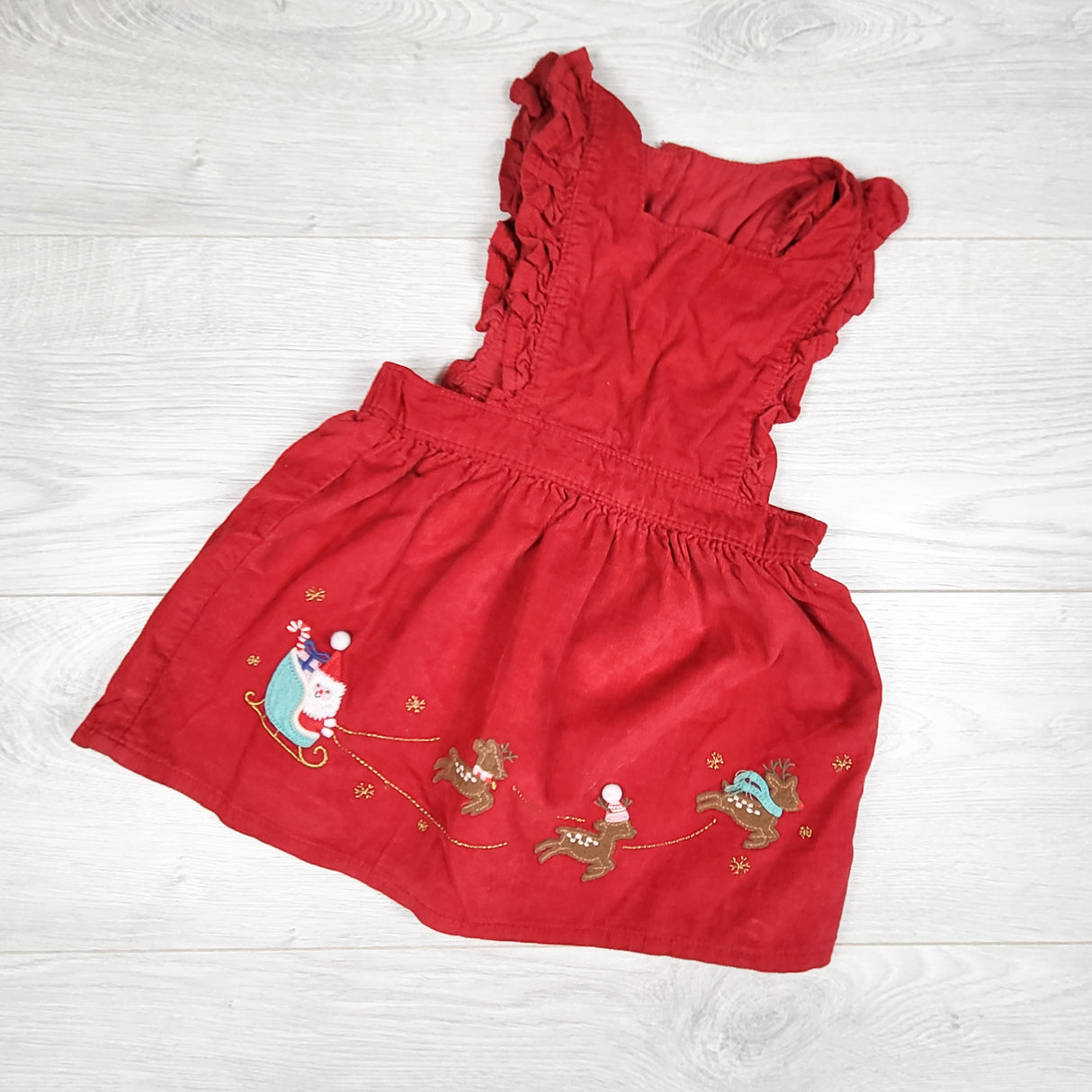 Marks and Spencer grey corduoy dress with Santa and his Sleigh. Size 9-12 months