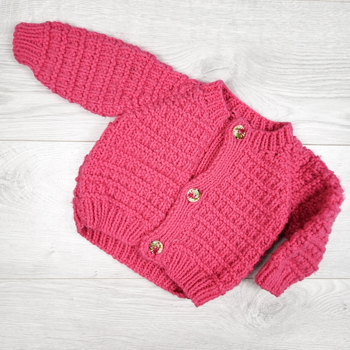 Pink handmade cardigan sweater. Sizes like 6-12 months