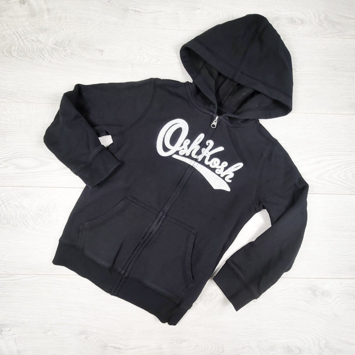 Oshkosh black zip up hoodie. Size 8