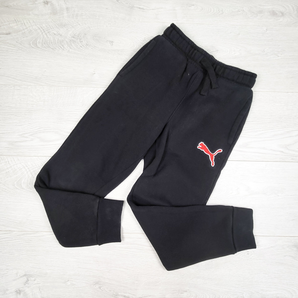 Puma black fleecy lined joggers. Size 7/8