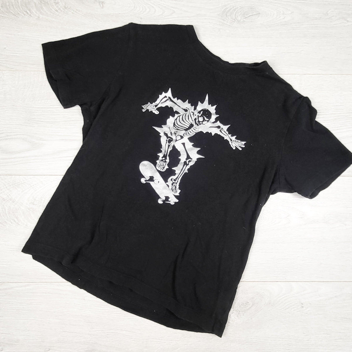 Old Navy black skateboarding skeleton t-shirt. Size 8