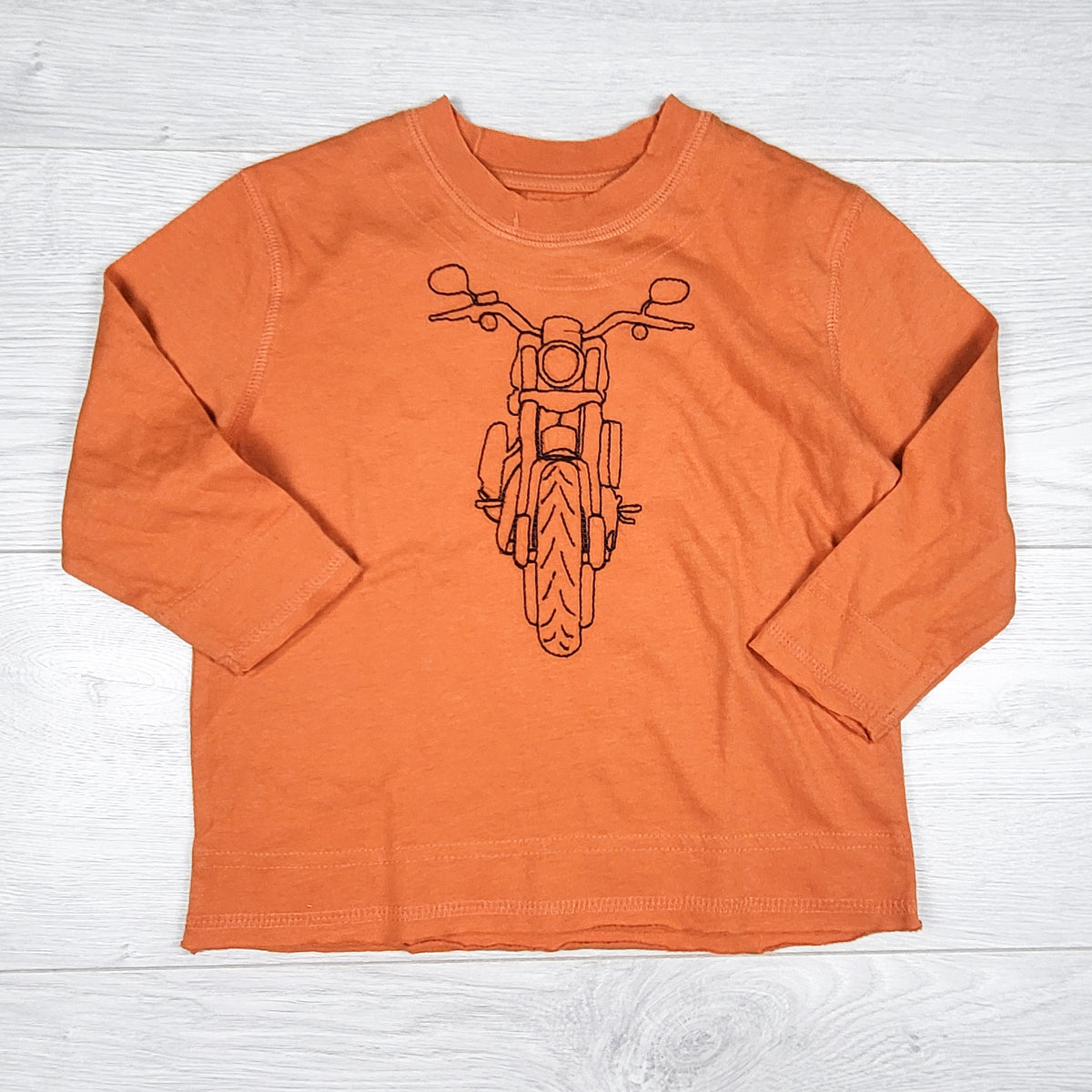 Joe orange top with motorcycle with raw edge hem. Size 2T