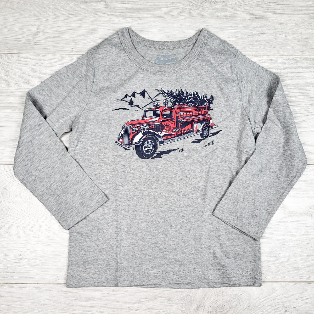 Oshkosh grey top with with fire truck carrying a Christmas tree. Size 4T