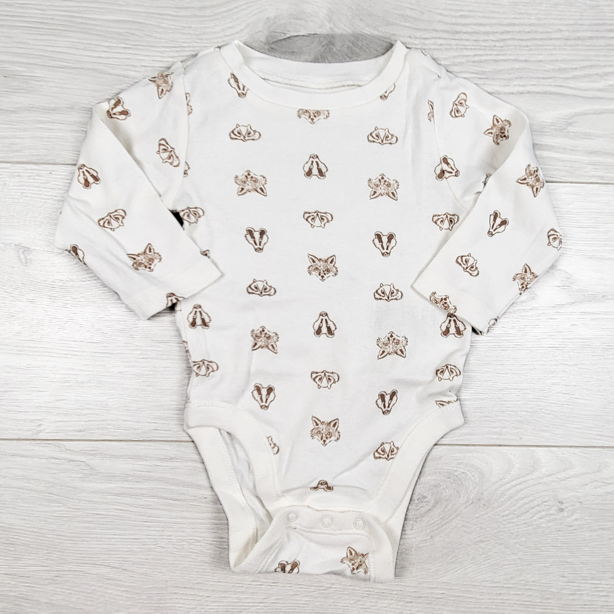 Old Navy cream coloured bodysuit with woodland animals. Size 3-6 months