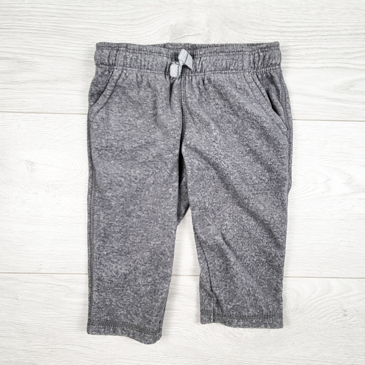 Carters grey fleece pants. Size 6 months