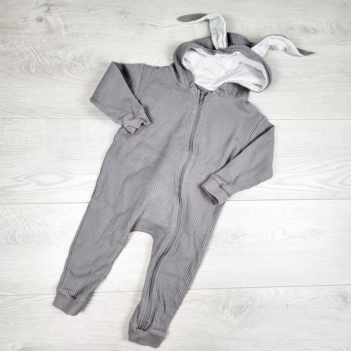 The Littlest grey waffle knit organic cotton bunny romper. Size 18-24 months