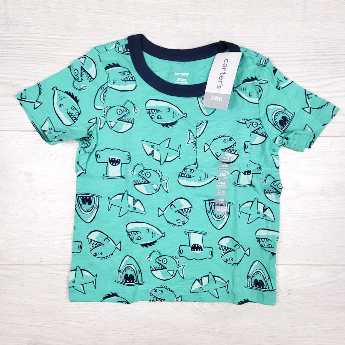 NEW - Carters teal shark print t-shirt. Size 24 months