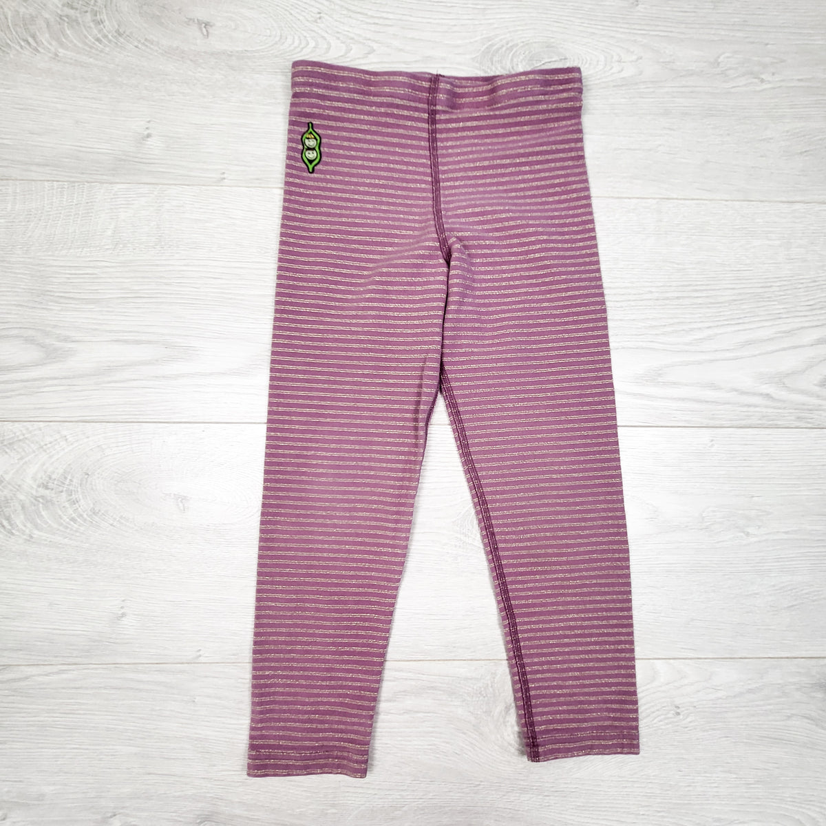 Peekaboo Beans purple leggings with gold sparkle stripes. Size 5T