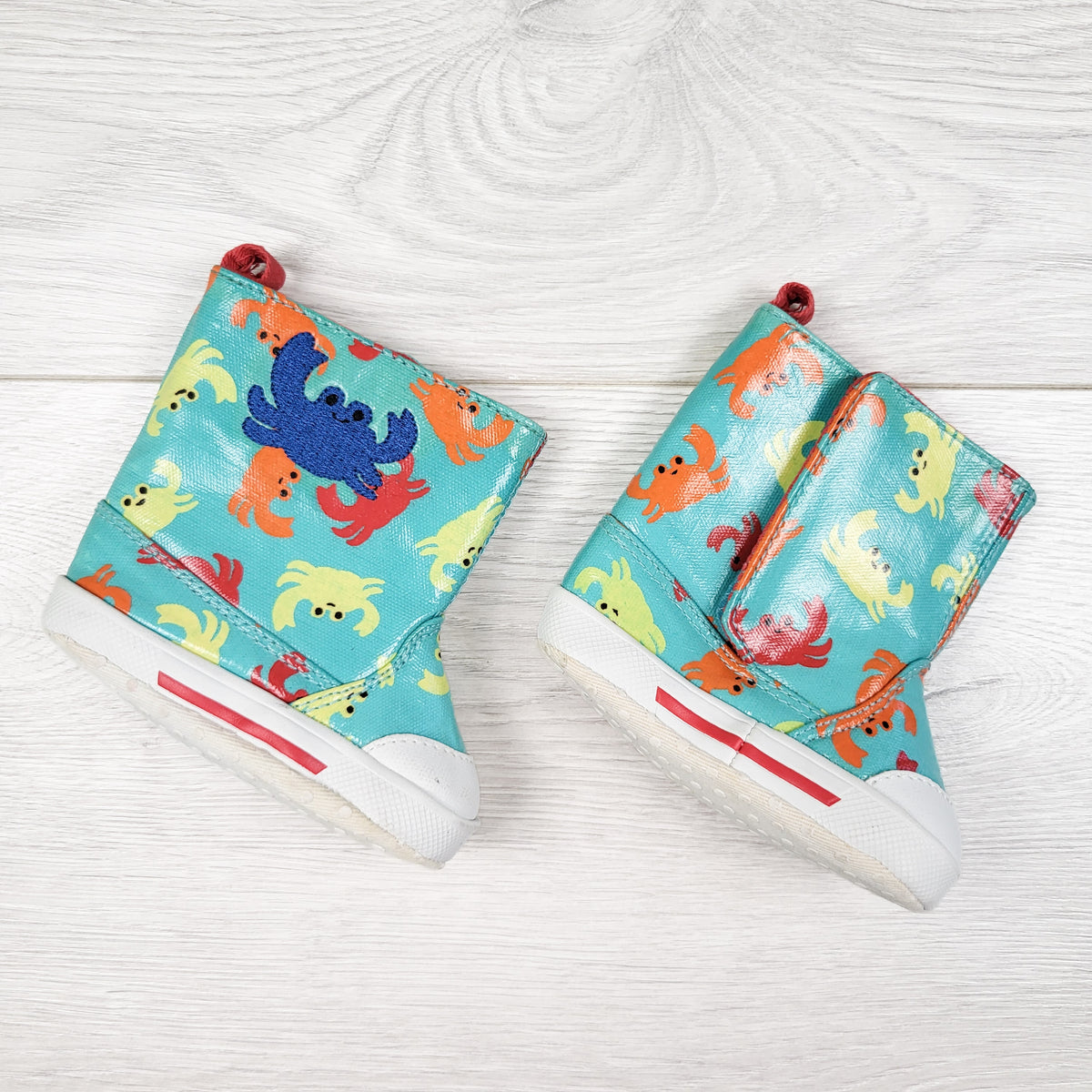 Joe turquoise rain booties with crabs. Size 2