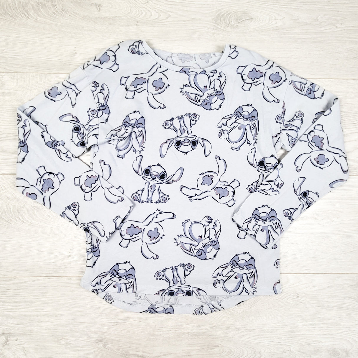 Disney blue Lilo and Stitch blue long sleeve top. Size 8
