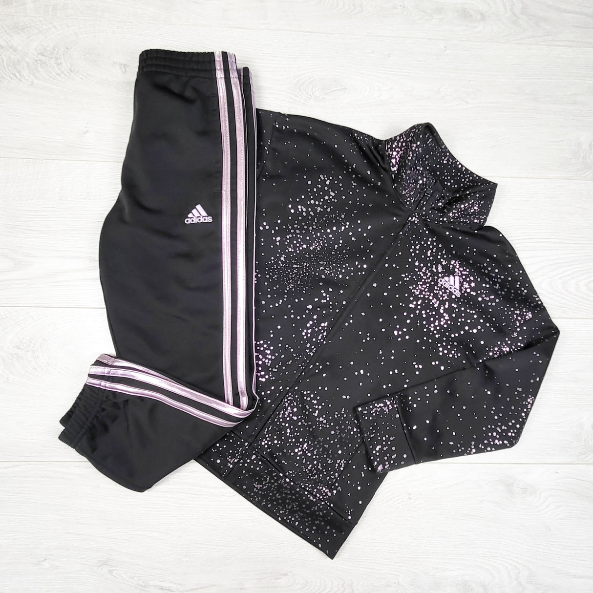 Adidas black and pink sparkle patterned 2pc track suit. Size 6