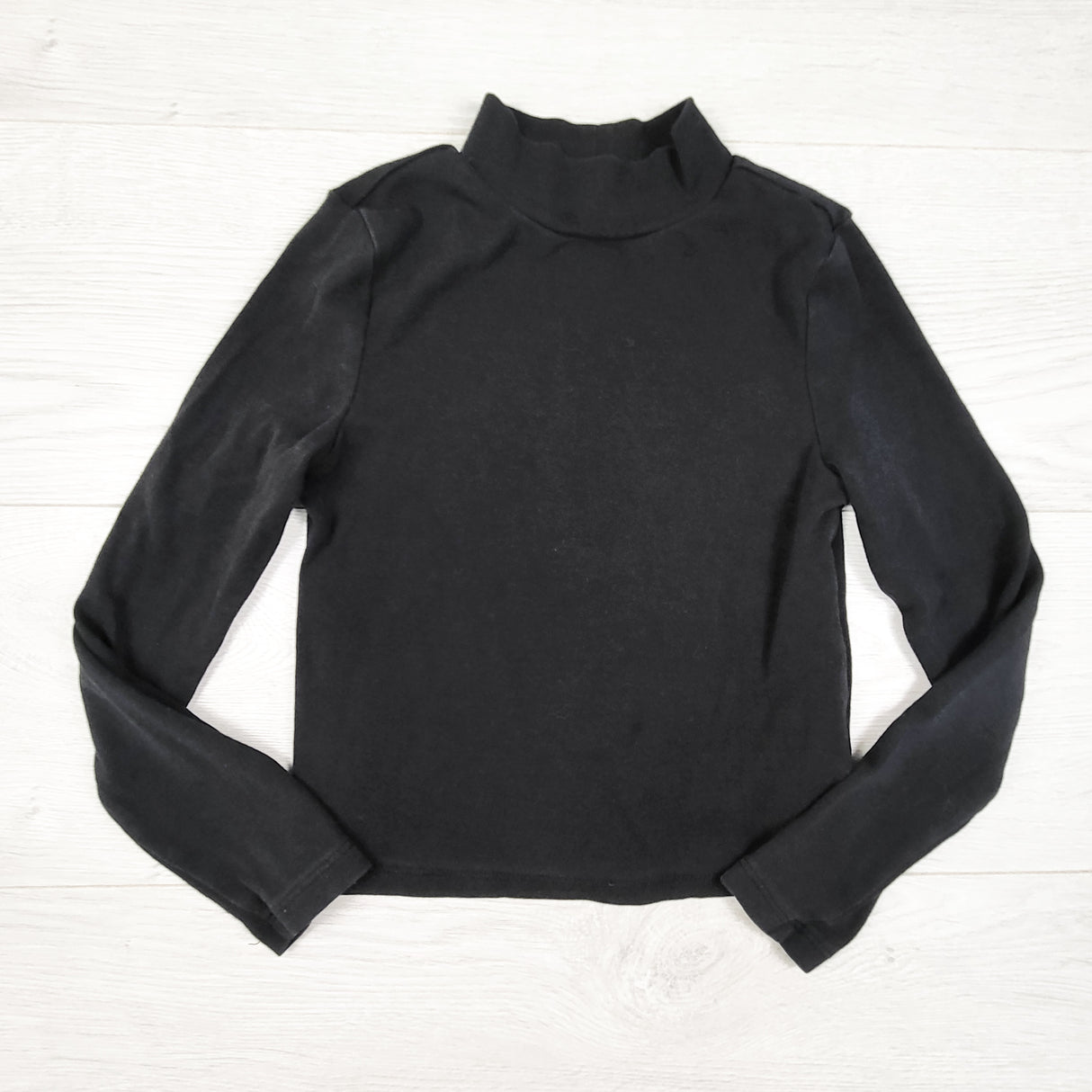 Gap black mock neck top. Size 6/7