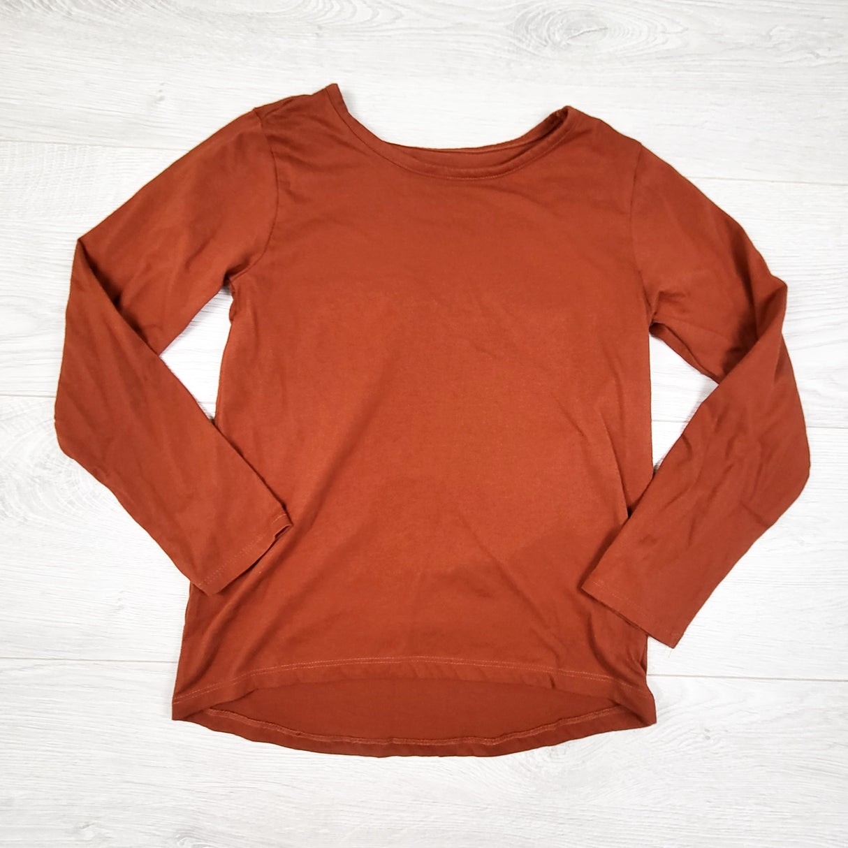 Children's Place rust coloured long sleeve top. Size 7/8