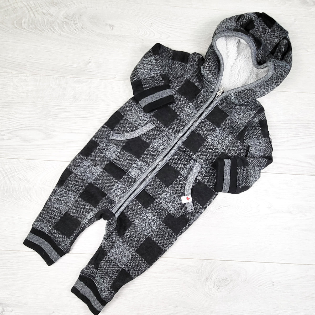 Canadiana buffalo plaid knit romper. Size 6-12 months