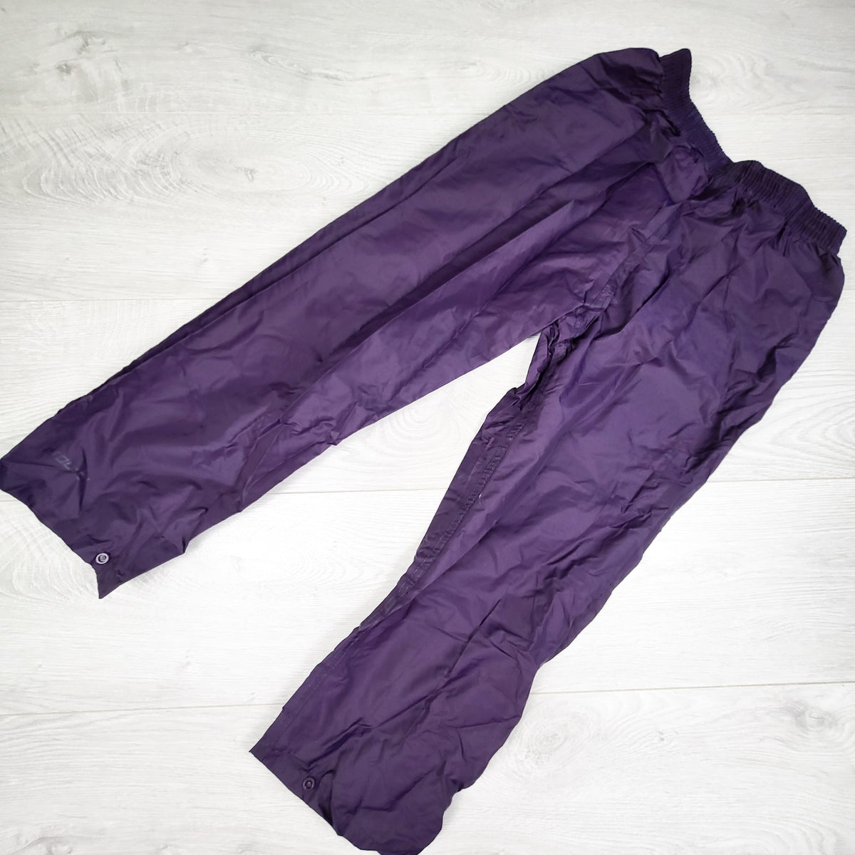 Mountain Warehouse purple packable "Pakka" rain pants. Size 7/8
