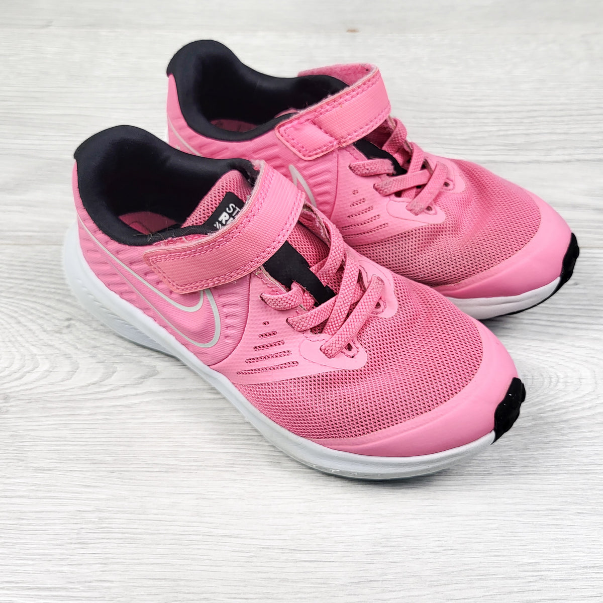Nike pink running shoes. Size 12