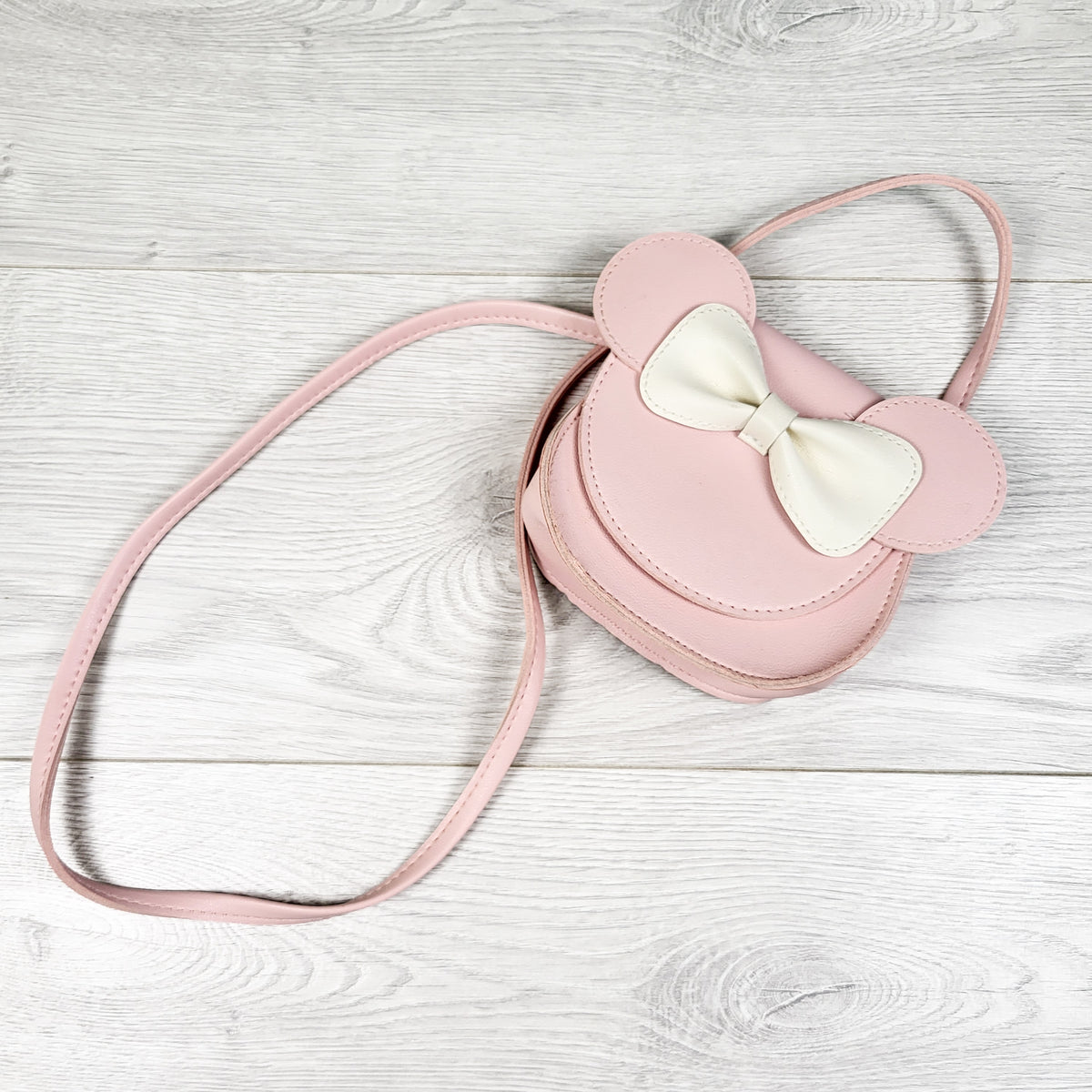 Pink faux-leather mouse-eared crossbody bag