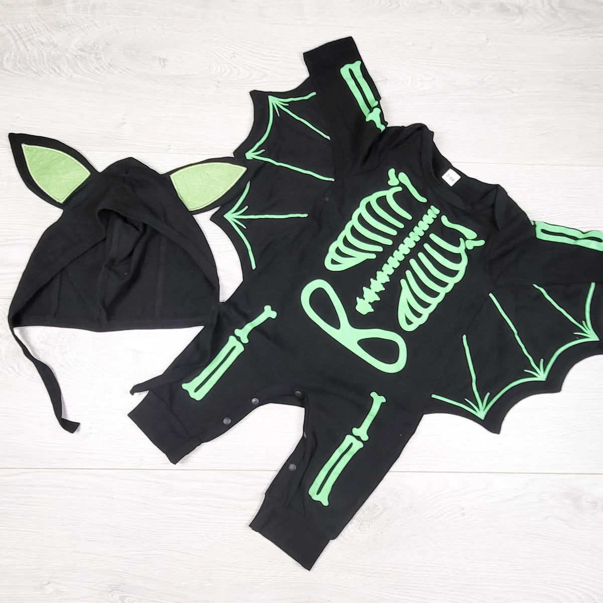 Black bat skeleton costume with matching hat. Size 3-6 months
