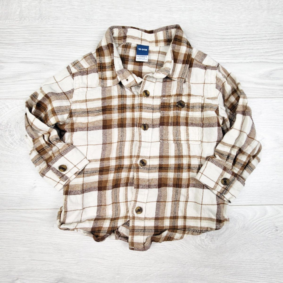 Old Navy tan and white plaid button down flannel shirt. Size 18-24 months