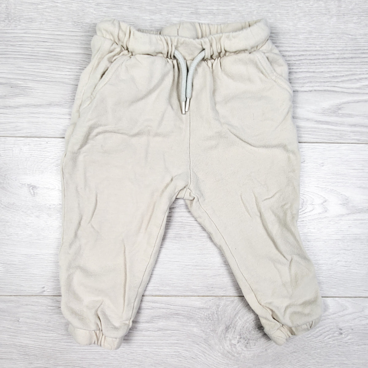 Old Navy off white drawstring joggers. Size 12-18 months