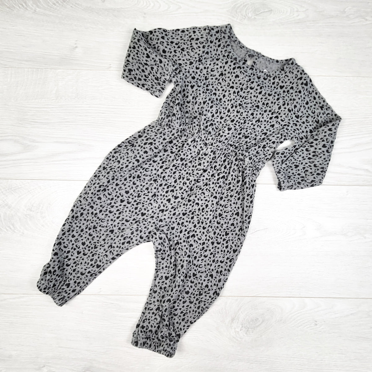 Old Navy grey leopard print romper. Size 6-12 months