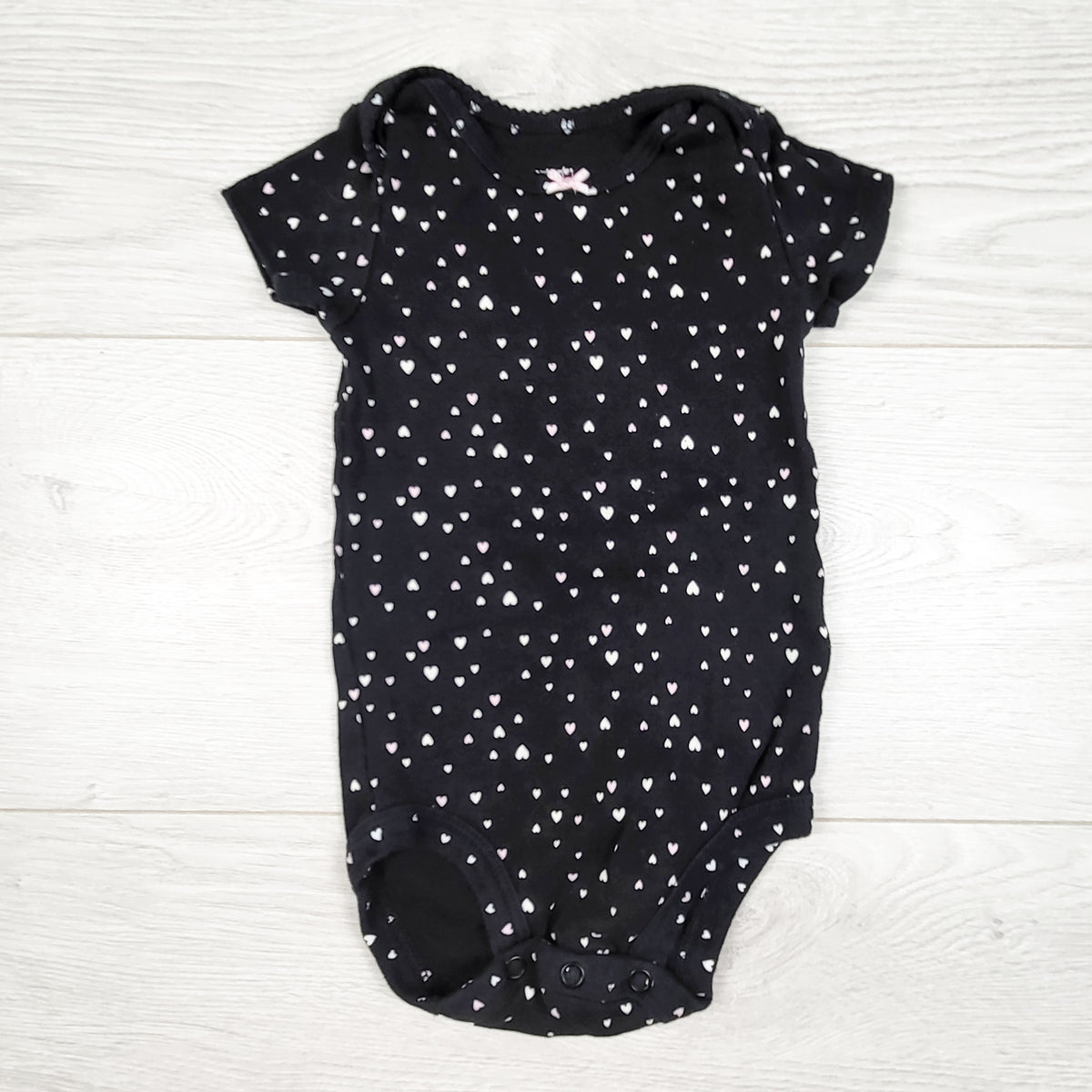 Carters black heart print bodysuit. Size 6 months