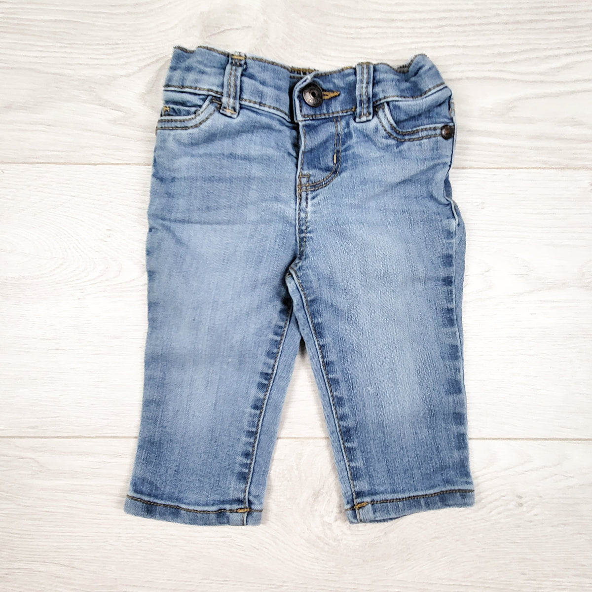Oshkosh medium wash skinny jeans. Size 6 months