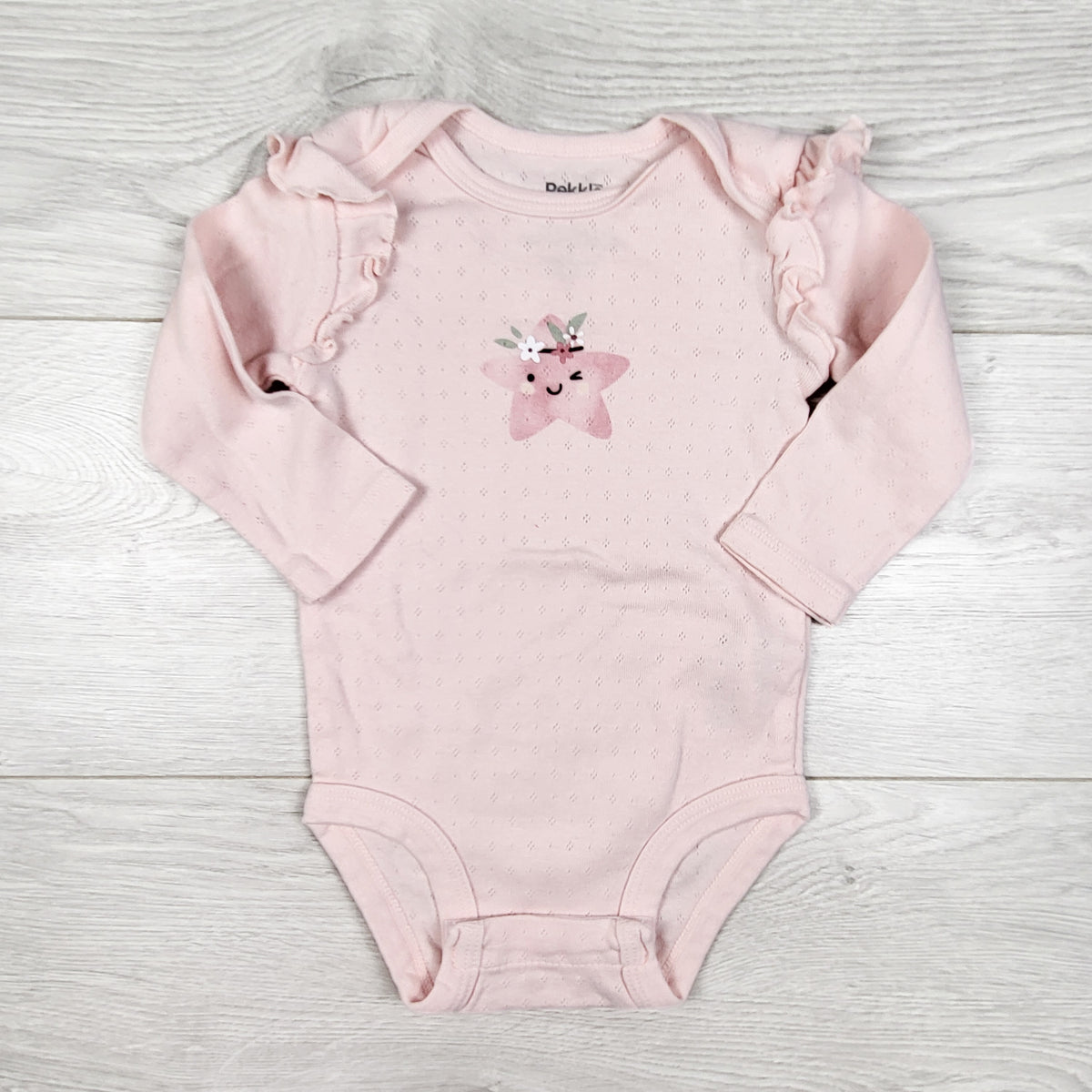 Pekklepink pointelle style bodysuit with star. Size 6 months