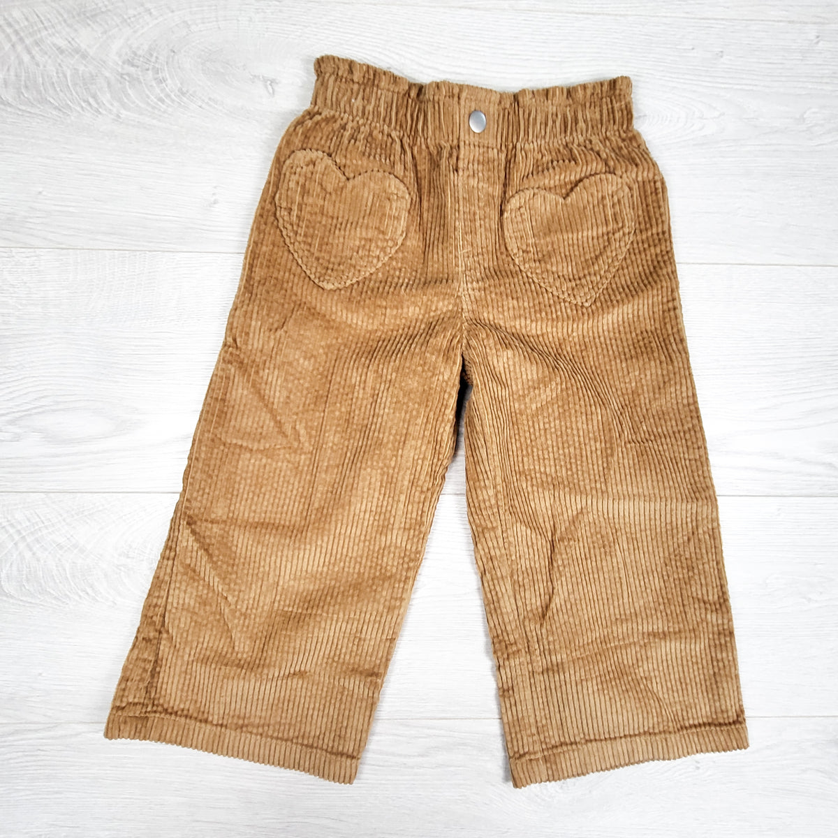 Old navy tan wide leg corduroy pants with heart pockets. Size 3T