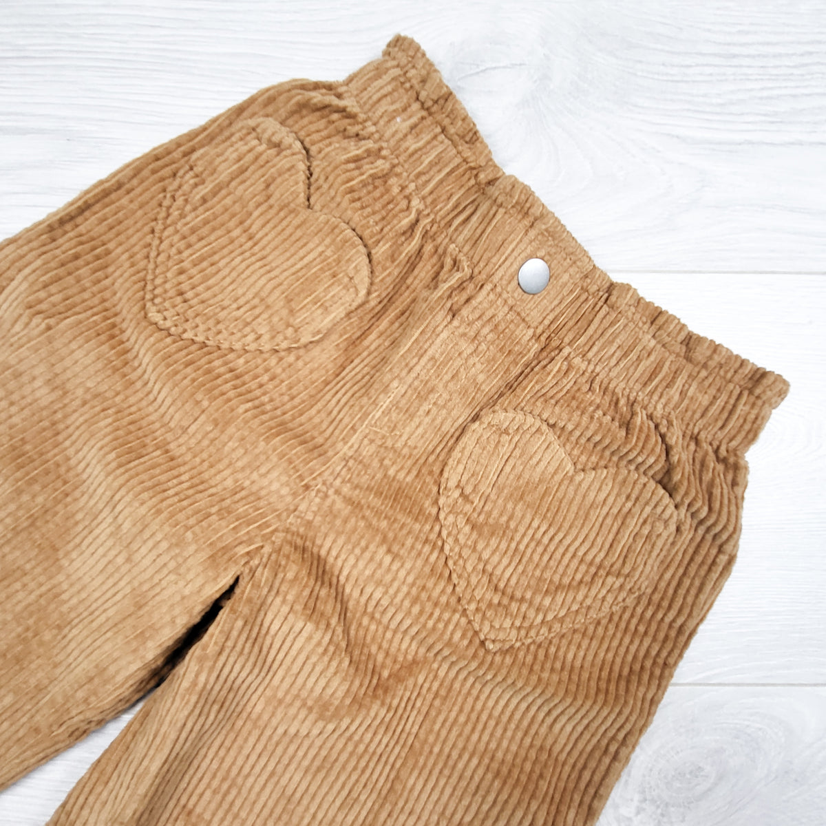 Old navy tan wide leg corduroy pants with heart pockets. Size 3T