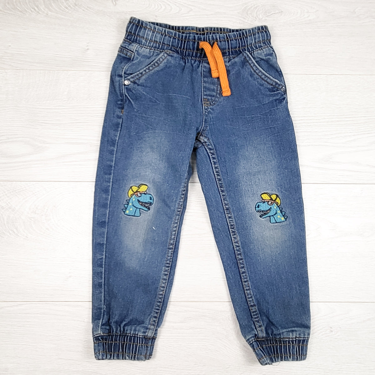 Kiki & Koko denim joggers with dinosaurs. Size 2/3T