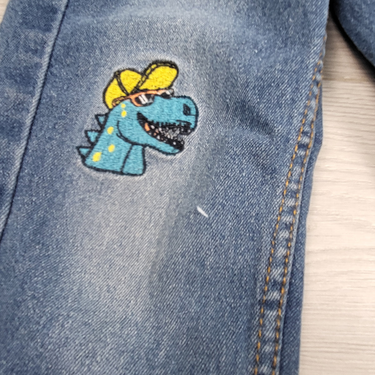 Kiki & Koko denim joggers with dinosaurs. Size 2/3T