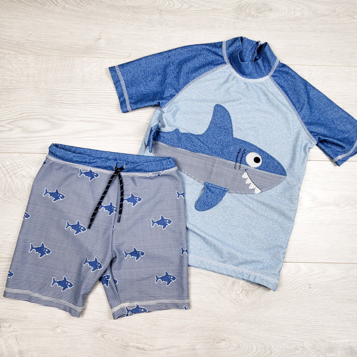 Next blue 2pc shark theme rash guard set. Size 5/6