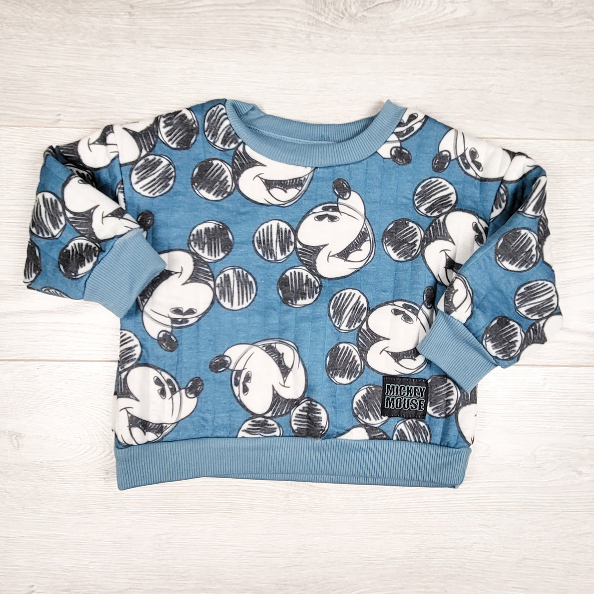 Disney teal quilted Mickey Mouse sweatshirt. Size 12 months