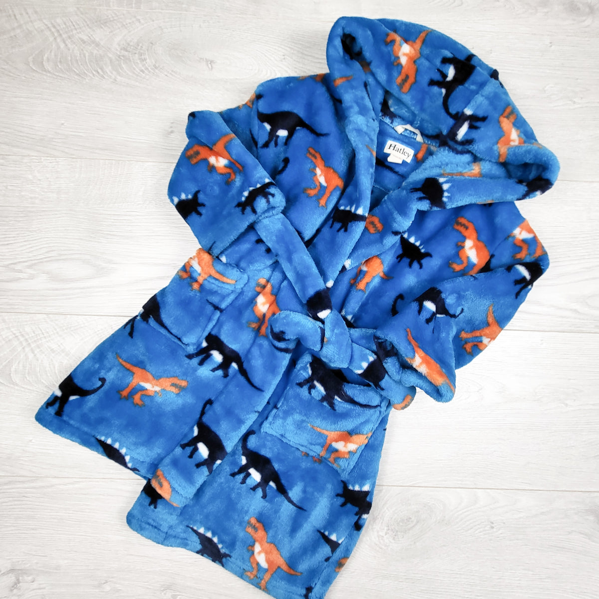Hatley blue plush dinosaur print robe. Size 2/3T