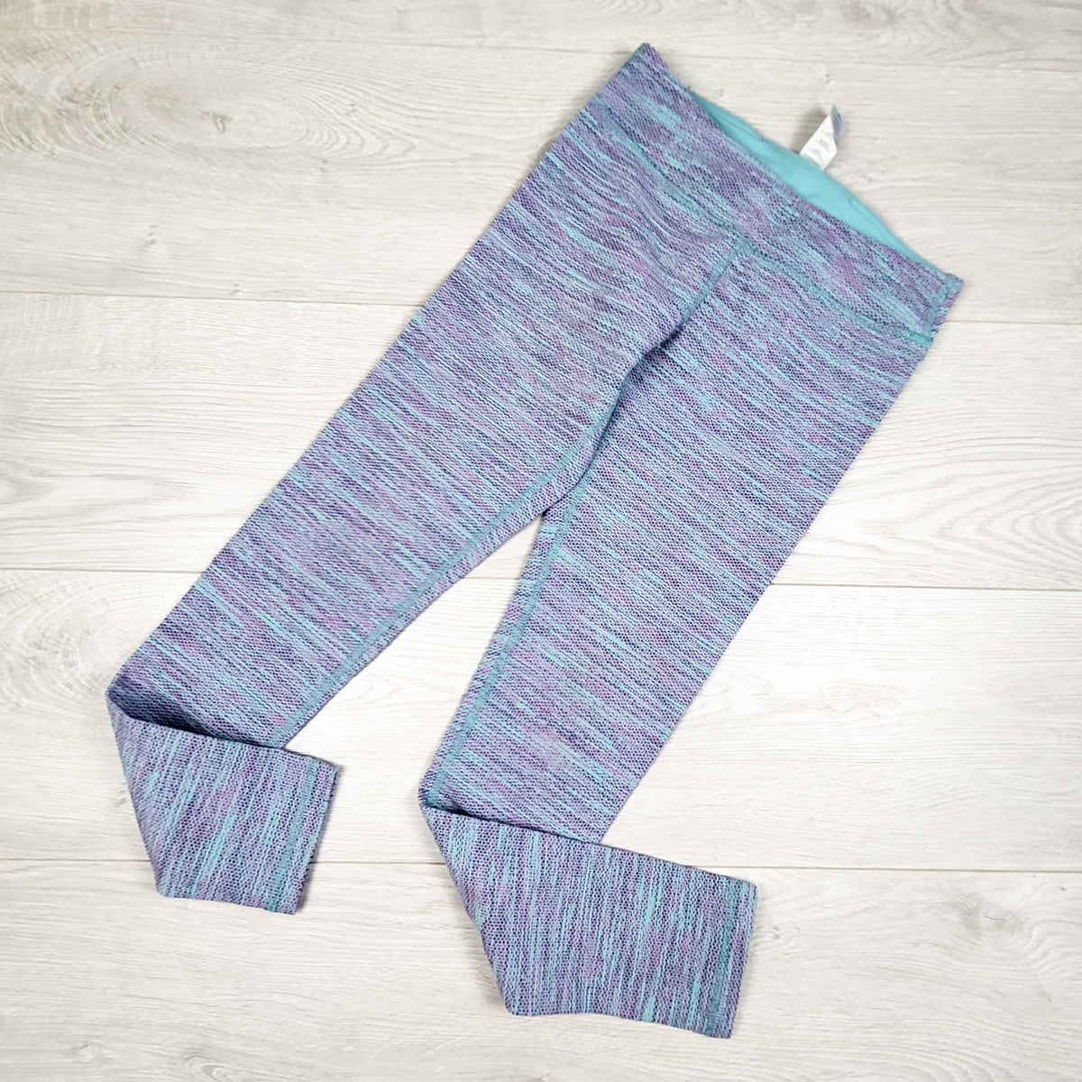 Ivivva by Lululemon purple and turquoise active leggings. Size 8