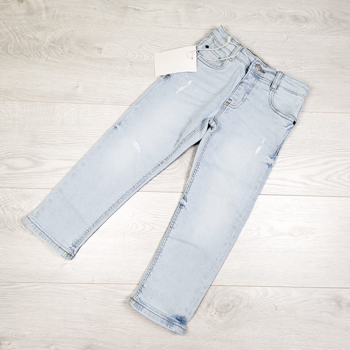 NEW - Zara light wash distressed straight leg jeans. Size 4T