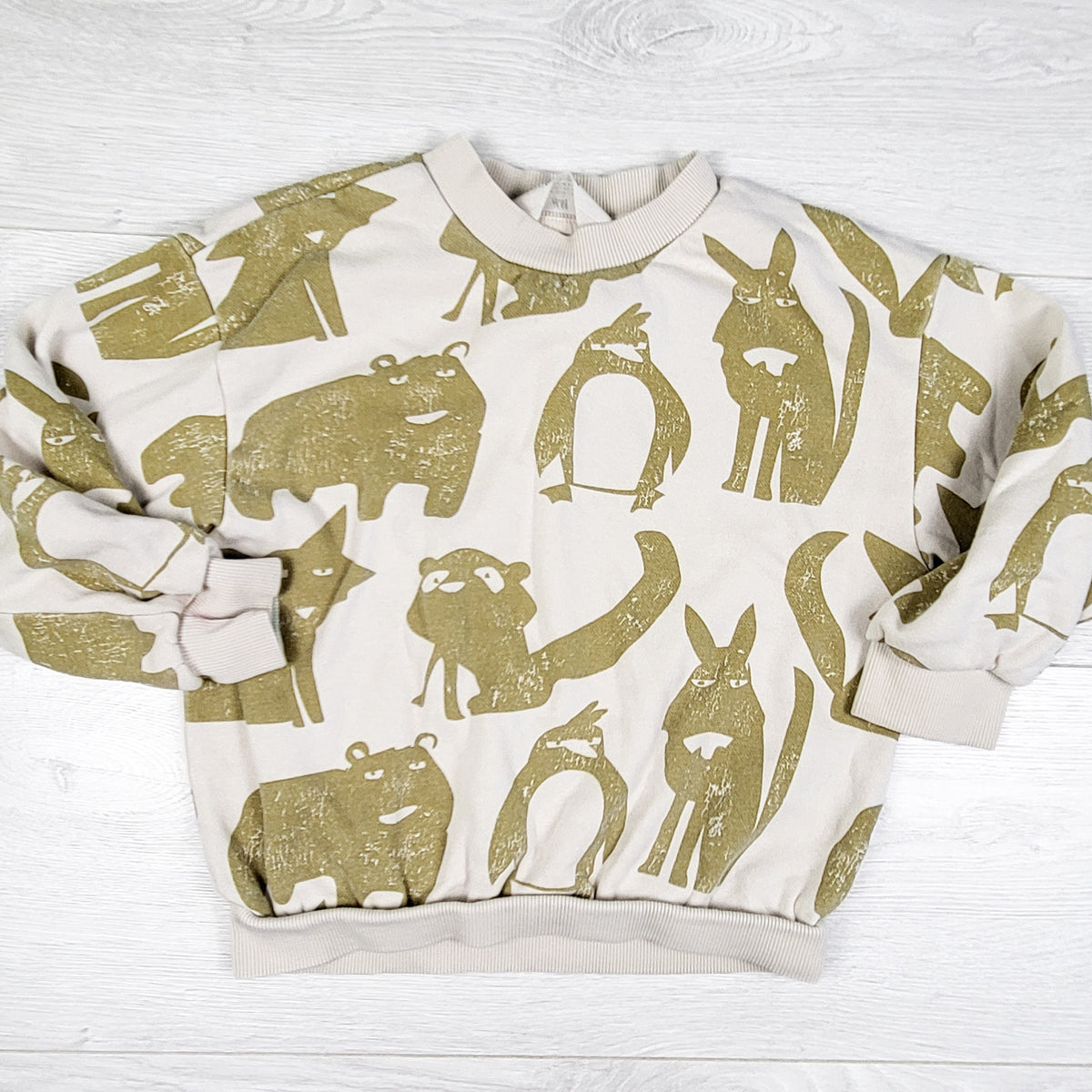 H and M beige sweatshirt with animals. Size 3/4T