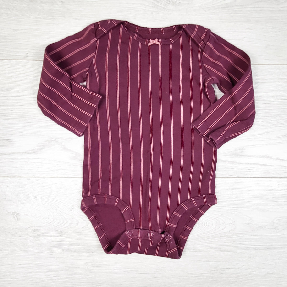 Carters plum and pink vertical striped bodysuit. Size 12 months