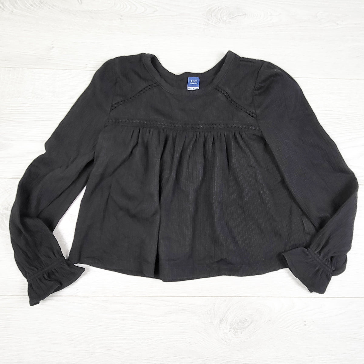 Old Navy black textured swing top. Size 6/7