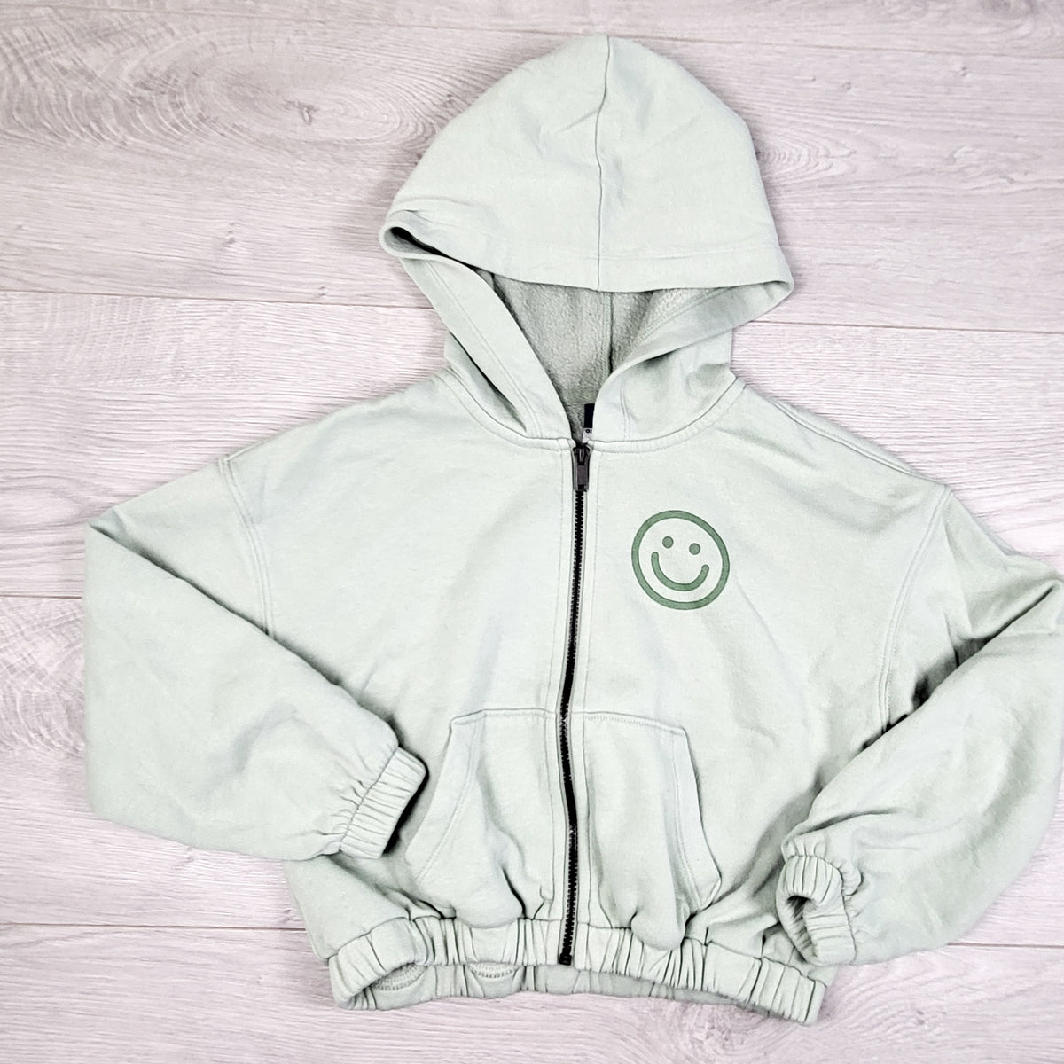 Old Navy mint zip up cropped hoodie with smiley face. Size 6/7