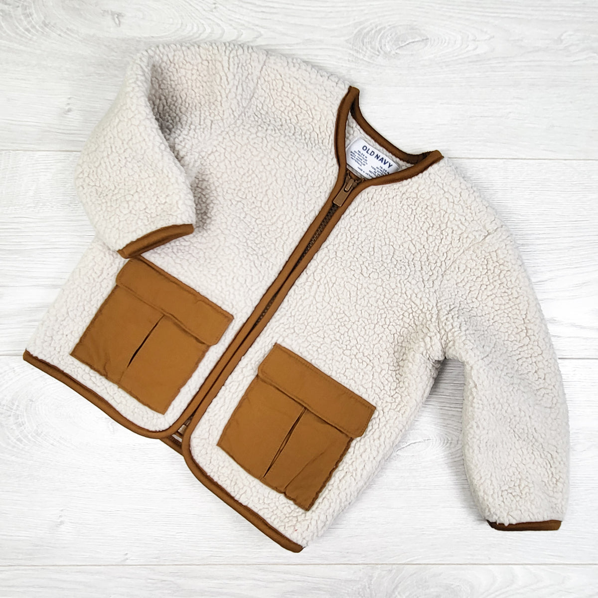 Old Navy sherpa jacket with tan trim. Size 18-24 months