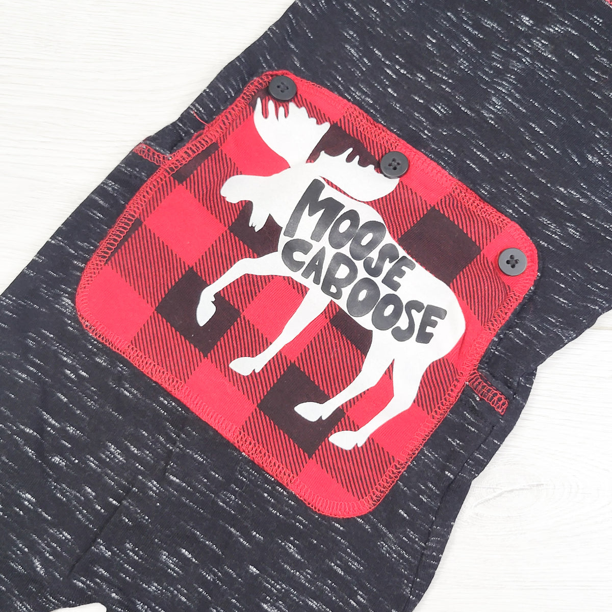 Lazy One black marled "Moose Caboose" sleeper. Size 2T