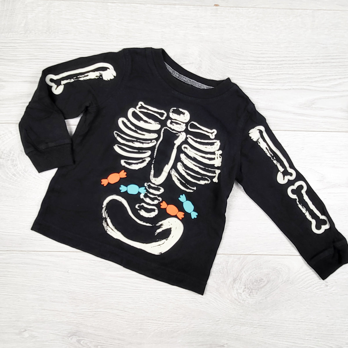 Carters black long sleeve top with skeleton. Size 18 months