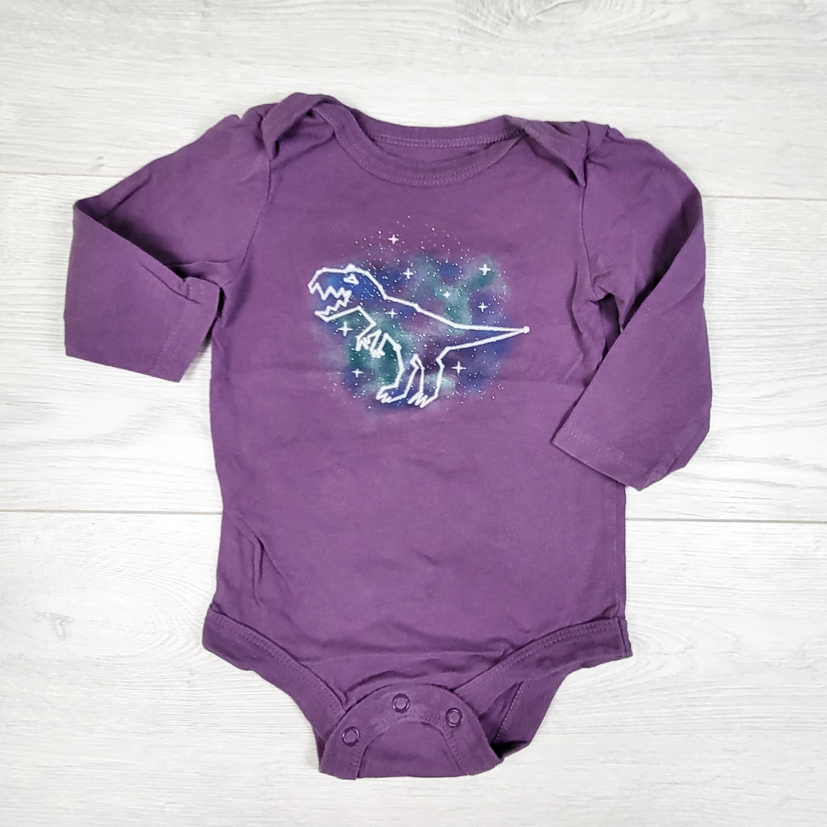 George purple bodysuit with dinosaur. Size 6-12 months